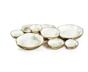Cluster of Nine Round Serving Bowls with White Enamel Interior