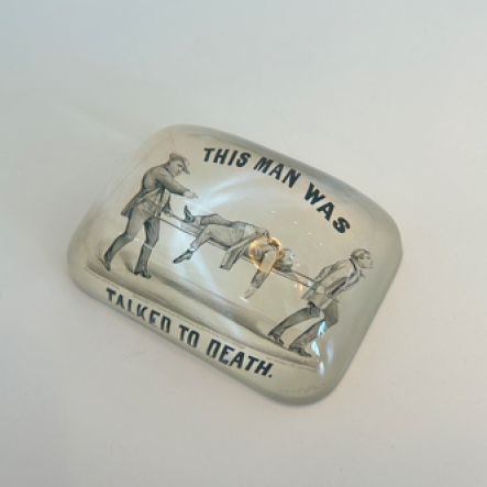 Talked To Death Paperweight